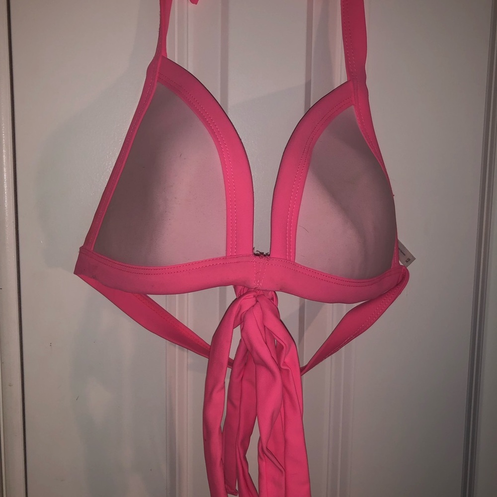 Pink bikini top ties around waist
